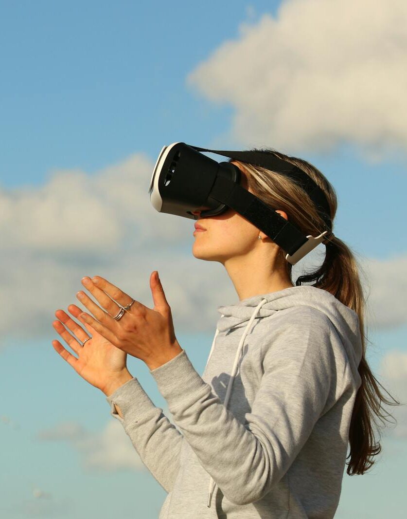 Woman Using Vr Goggles Outdoors